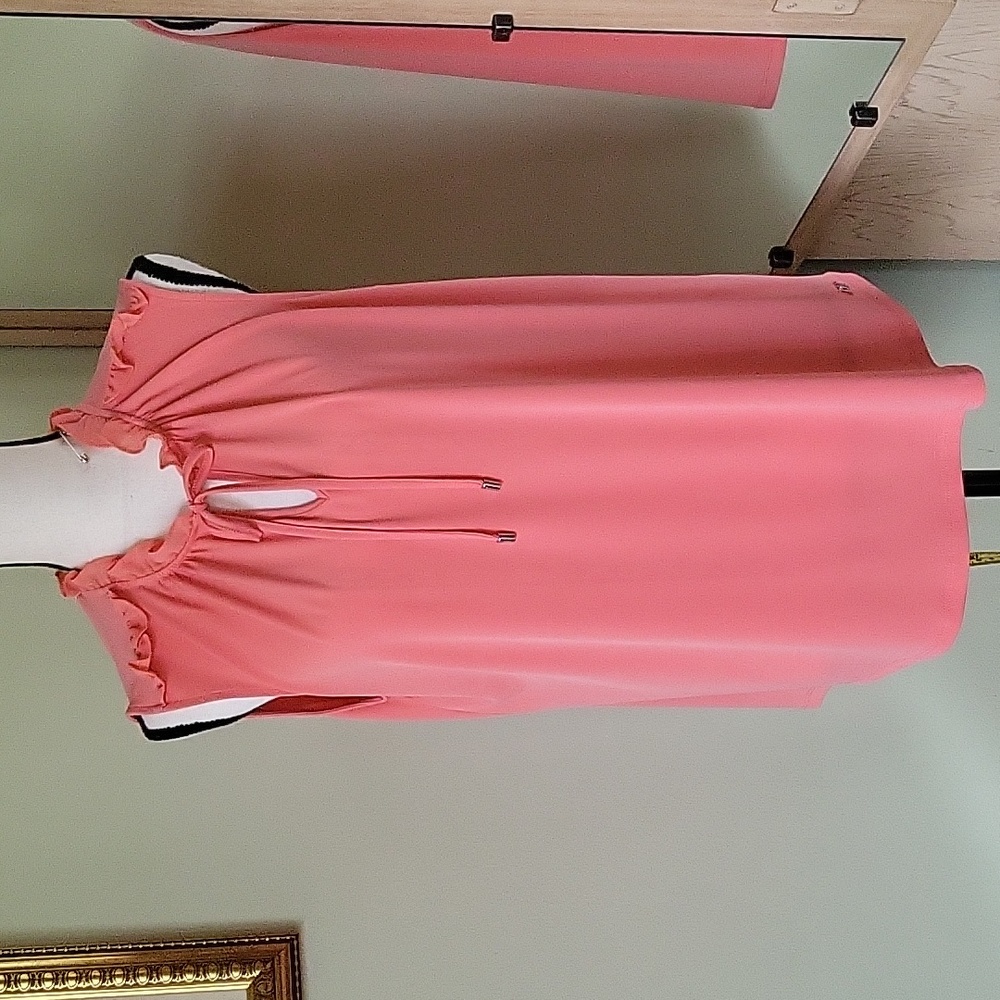Calvin Klein sleeveless blouse .  Never worn.  New condition
